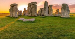 From Brighton: Stonehenge and Bath Full-Day Trip - Stonehenge: audio-guided walk and the visitor center that adds meaning