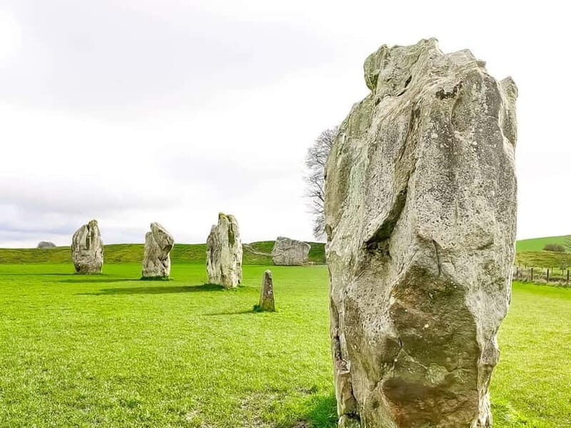 From London: Stonehenge & The Stone Circles of Avebury Tour - Walking up to West Kennet Long Barrow, then stepping into the chambers