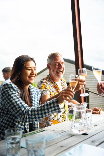 From London: Vintage Bus Wine Tour with Return Train Tickets - Stop 1 in Sussex: vineyard tour, paired lunch hamper, and serious tasting